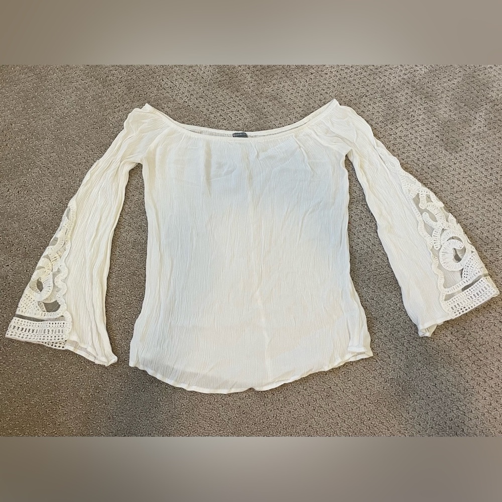 Ivory crinkle off the shoulder lace cut out top